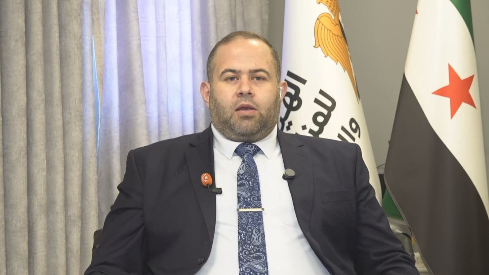 Mazen Alloush, Director of Public Relations at the General Authority for Land and Sea Border Crossings, speaks to Rudaw on July 28, 2025. Photo: Screengrab/Rudaw